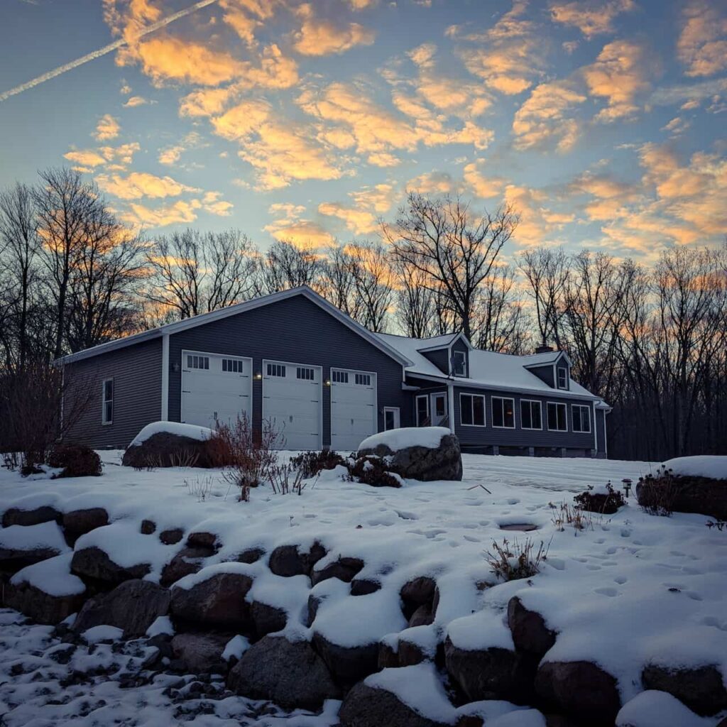 Photograph of the Luxury Acres Pet Resort Cabin (Home) with a sunset